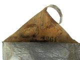 a piece of metal that has a piece of writing on it