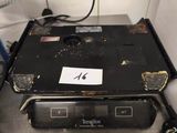 an image of a black electronic device on a counter
