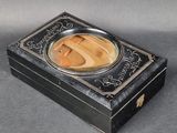 a black box with a picture of a person on it