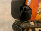 an image of a close up of a small electric tool