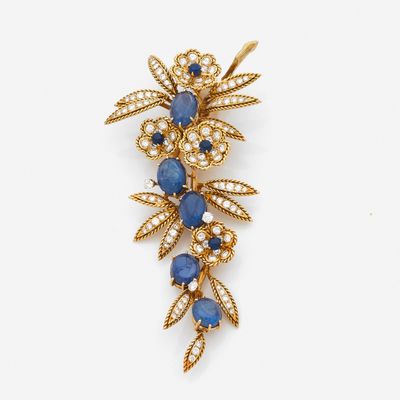 a sapphire and diamond broochle, by van cleef