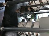 an image of a machine that is working on a piece of paper