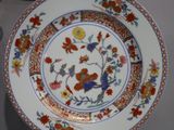 two plates that are sitting on a table