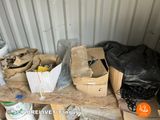 a pile of boxes sitting on a table in a storage area