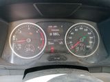 a close up of a car dashboard with a speedometer and gauges