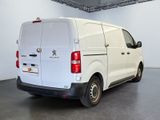 a white van that is parked in a room
