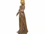 bronze statue of a woman holding an umbrella on a white background