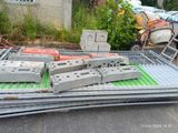 a pile of concrete blocks sitting on top of a green mat