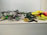 a pile of assorted items sitting on a counter