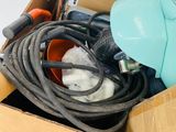 a box full of assorted items and tools in it