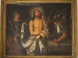 un tableau représentant Jésus assis sur la croix avec d'autres hommes