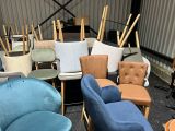 many chairs and chairs that are sitting in a room