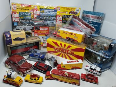 many different types of toy cars and trucks in a box