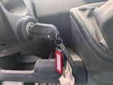a key that is attached to the front of a car