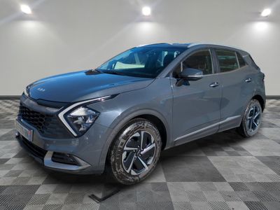 a grey 2020 hyundai kona suv parked in a garage