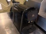 a coffee machine that is sitting on the counter