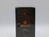 un flacon de parfum Olazeta posé sur une surface blanche