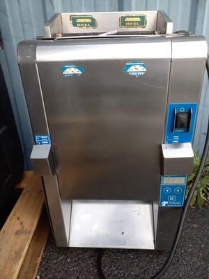 a machine that is sitting on the side of a building