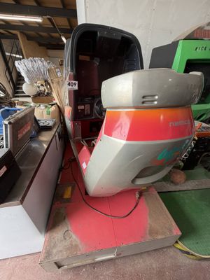 a motor boat that is sitting in a garage