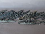 a lot of toy ships that are on a table