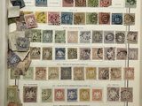 an open book with a bunch of different stamps on it