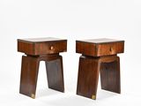 a pair of walnut bedside tables with brass legs
