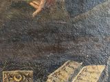 an old painting of a man sitting at a table with a book