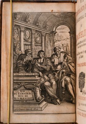 un vieux livre sur lequel figure l'image d'un homme assis sur un banc