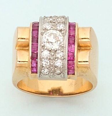 an image of a diamond and ruby ring on a white background
