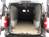 a white van with its doors open and the back door open
