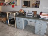 an image of a work room with a lot of clutter
