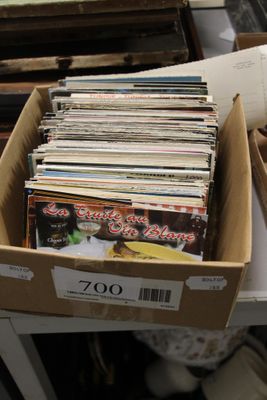 a box full of magazines sitting on a table
