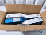 a box with two boxes of wii remotes inside of it