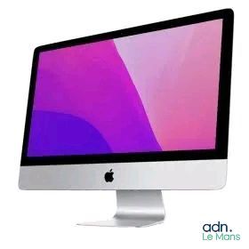 a computer monitor sitting on top of a desk