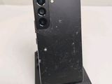 the back of a black phone with a camera attached to it