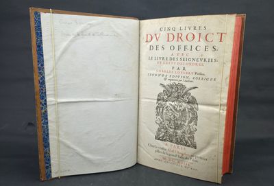 an open book with a picture of a bird on it