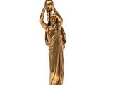 une statue en or représentant une femme tenant un oiseau sur son épaule