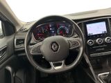 a picture of a dashboard of a car with a steering wheel