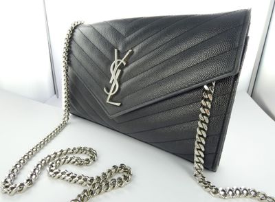saint laurent black chevrone leather clutch bag with chain strap