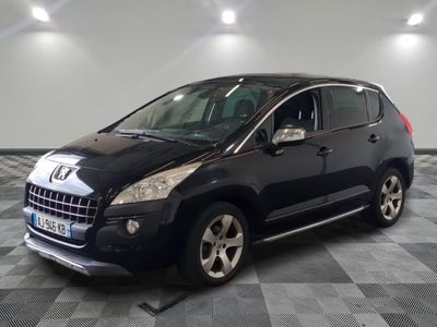a picture of a black car parked in a garage