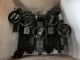 a box with a bunch of black wheels inside of it