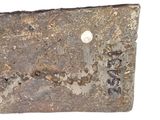 an image of a piece of metal with a hole in it