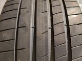 a close up of a tire on a white background