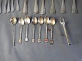 a lot of spoons and spoon spoons that are on the table
