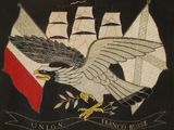 embroidered picture of an eagle flying over a ship with a flag