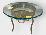an image of a glass table with a metal ring on it