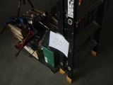 a pile of tools sitting on top of a wooden crate