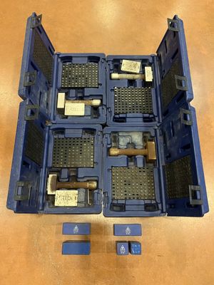 a blue box with tools inside of it on a table