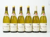 six bouteilles de vin blanc alignées