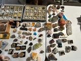 a table with a lot of rocks and stones on it